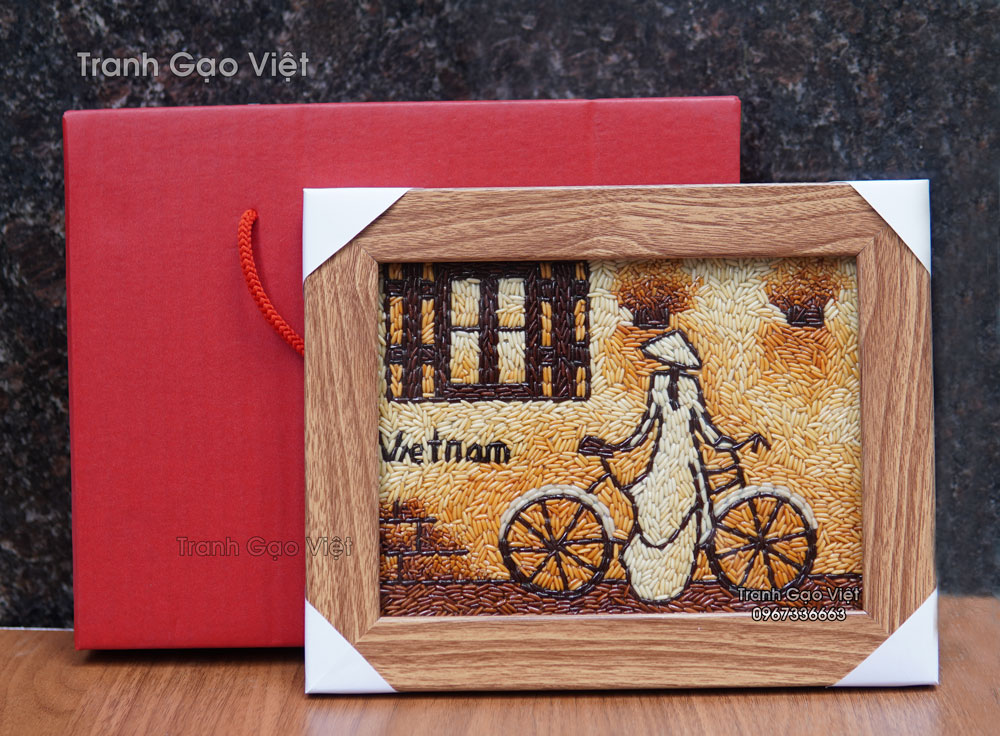 Tranh gạo áo dài để bàn